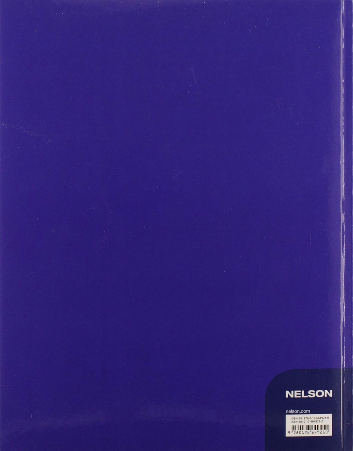 Blue book with Nelson branding on a blue background.