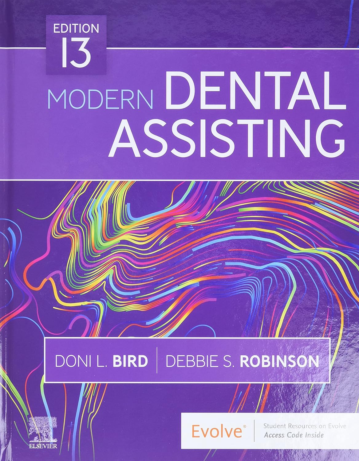 Book titled 'Modern Dental Assisting' with colorful design on a purple background